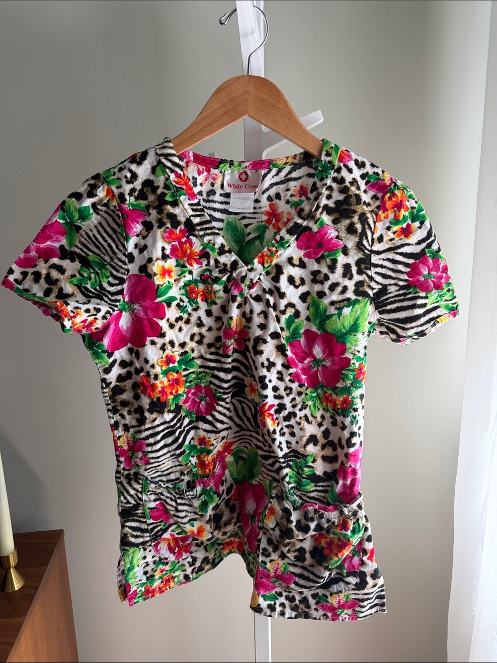 White Cross Floral & Zebra Print V-Neck Scrub Top — Pink, Green, Black